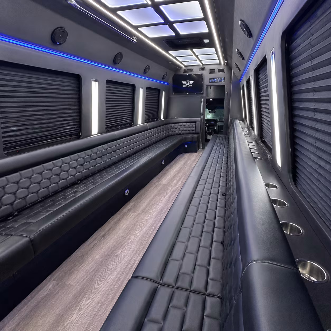 Wedding guests seated inside a party bus serving Toledo